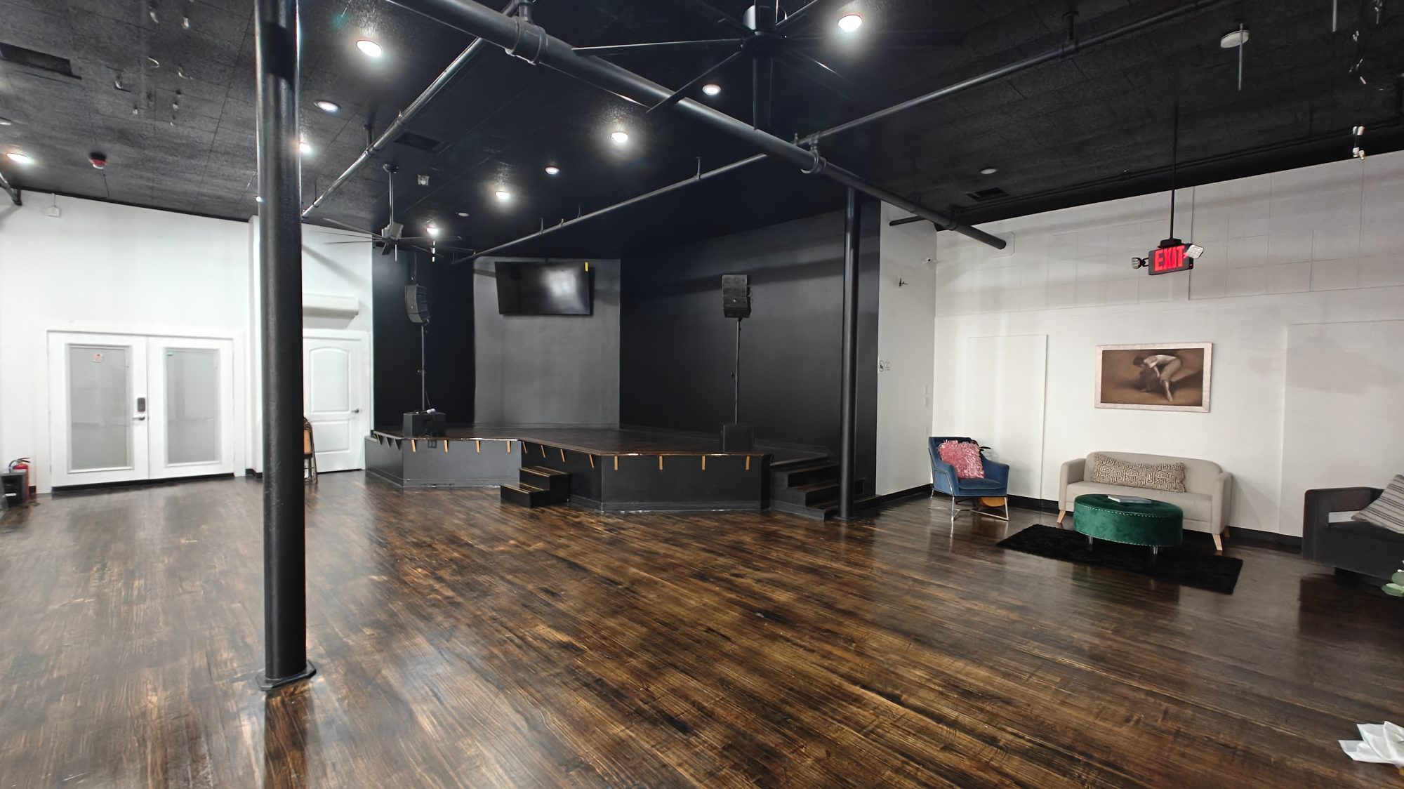 Open floor and low black stage at BE-ONE Studio