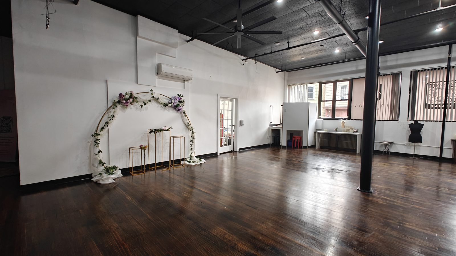 Celebration arch set up on the open floor
