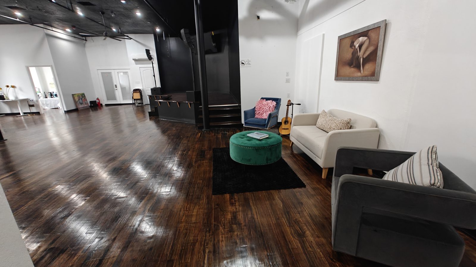 Lounge seating beside the stage